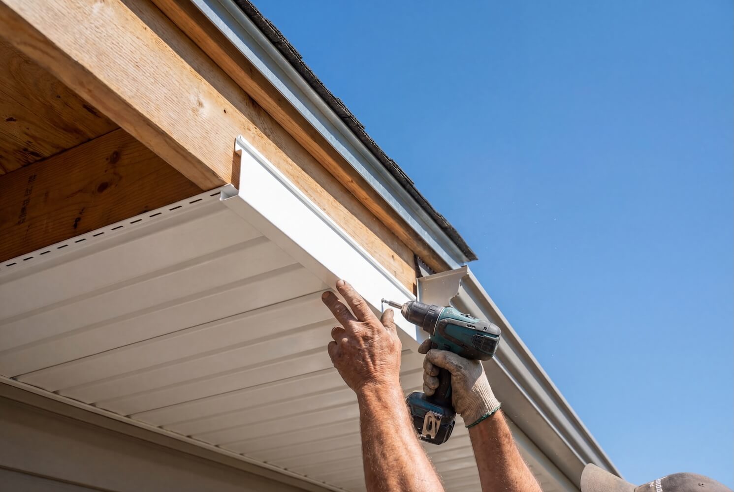 Siding contractor replacing exterior siding on a Washington home