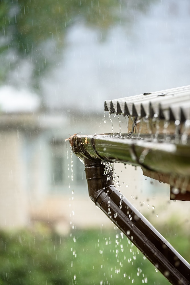 rain flows down from a roof down